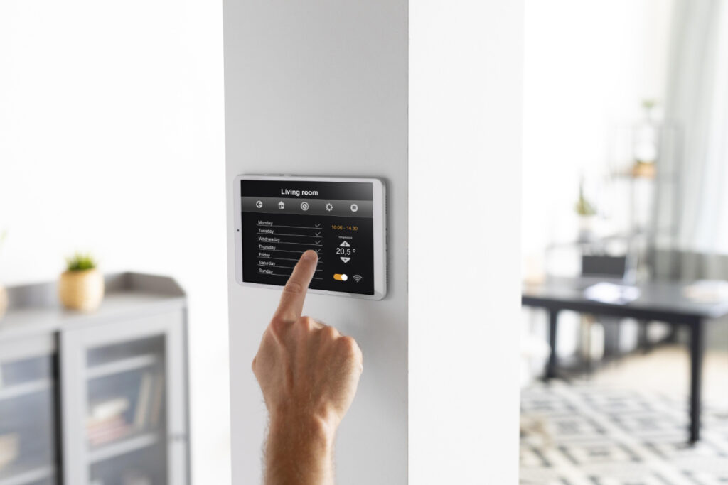 man-using-tablet-his-smart-home (1)